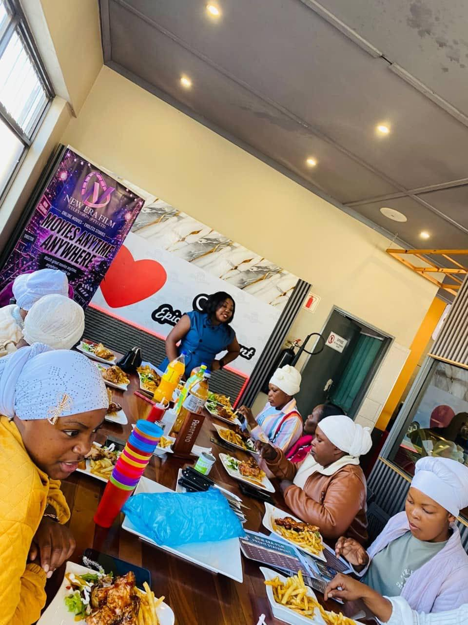 NEF team enjoying a meal together after an event