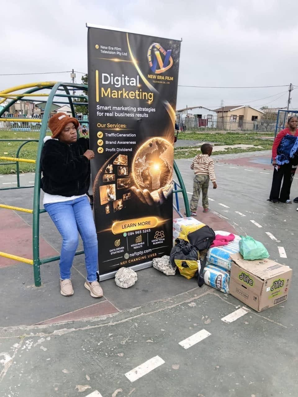 NEF digital marketing banner at a community outreach event
