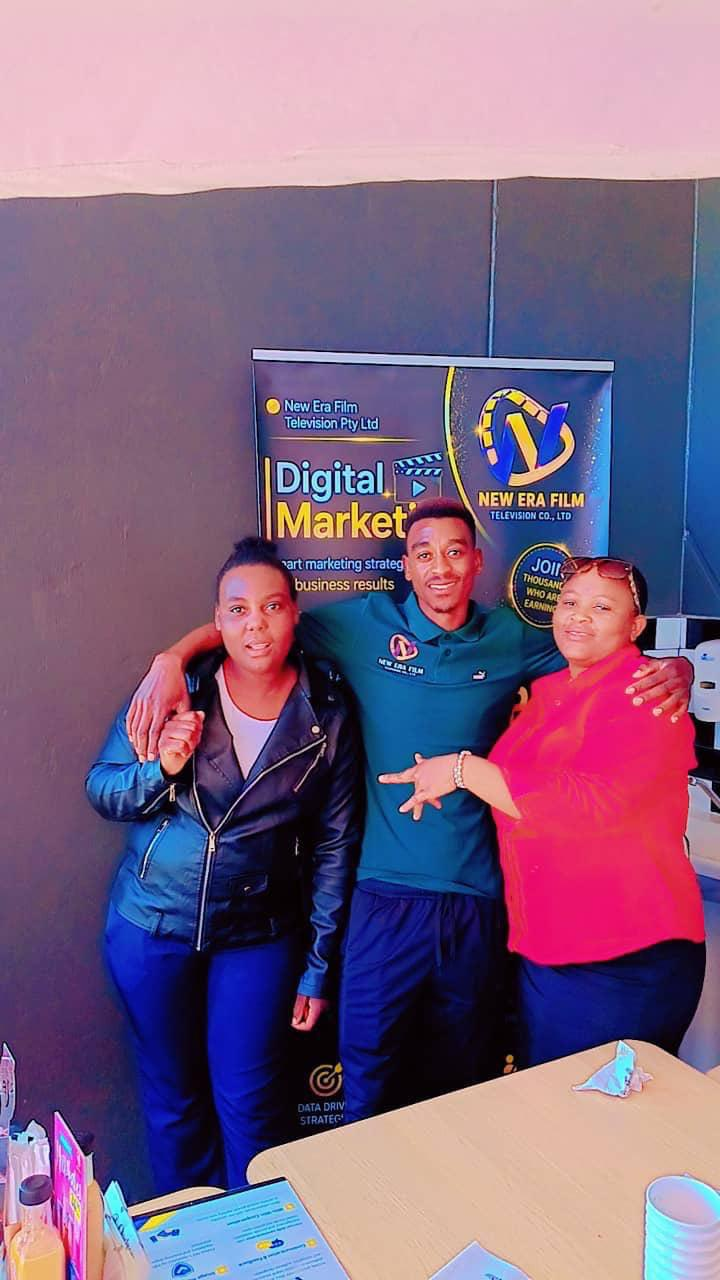 NEF digital marketing team at a promotional stand